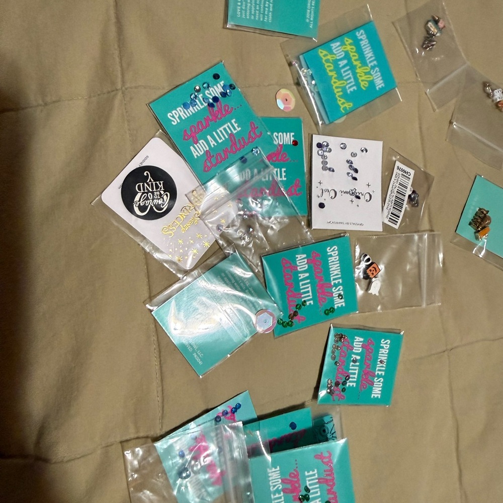 Origami owl lot of charms and sparkle beads. Includes some plates.